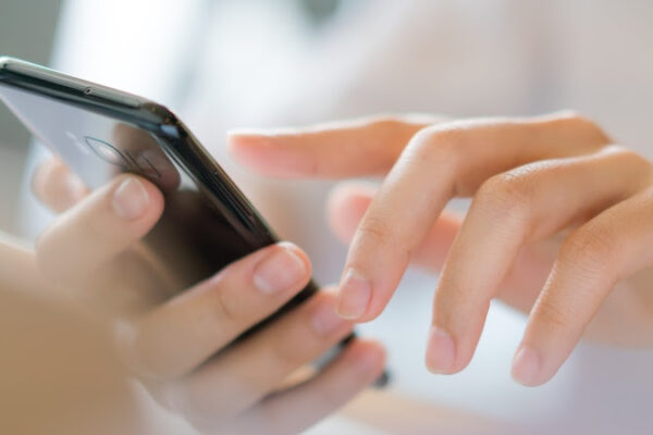 Business Hand With Mobile Phone .